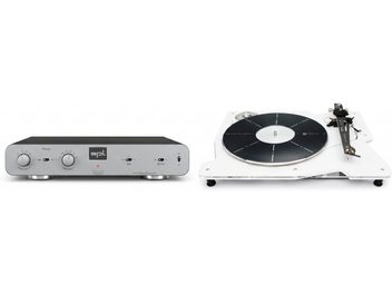 Sølvfarvet SPL Phonos phono-forforstærker ved siden af en hvid pladespiller med sort pladetallerken og sort tonearm
