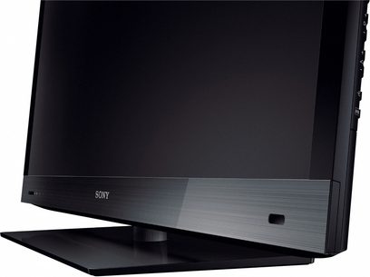 Televisore Sony KDL-55EX720 a schermo piatto nero visto di profilo, base rettangolare grigia, logo Sony sul lato