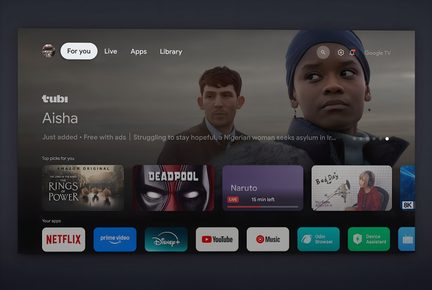 Black rectangular flat screen made of plastic, front view, displaying a Google TV interface with multimedia content thumbnails and a row of colorful app icons