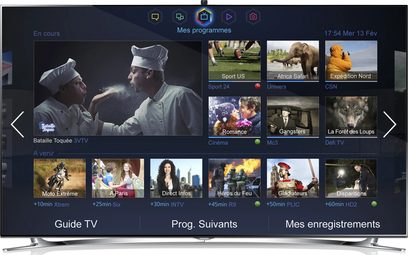 Samsung UE40F8000-fladskærm, der viser en brugergrænseflade med tv-programmer, set forfra