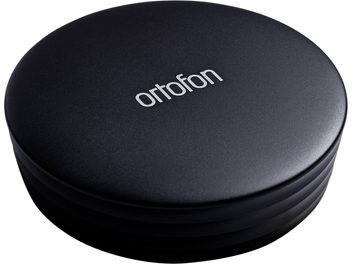 Paleta prensadora para platos de vinilo Ortofon, estabilizador de discos negro, vista en ligero picado, superficie lisa, logotipo centrado grabado