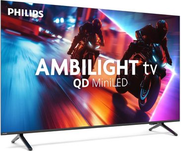 Czarny telewizor Philips 65MLED910 w wysokiej rozdzielczości, z cienką metalową ramką i dwoma nóżkami w kształcie litery V, widok z przodu lekko z boku