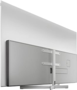 Televizor Loewe Stellar 77 DR+ gri, vedere din spate cu suport central și picior dreptunghiular