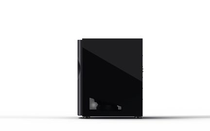 Black rectangular case, smooth side panel with a ventilation grille at the bottom, circular feet, right side profile view