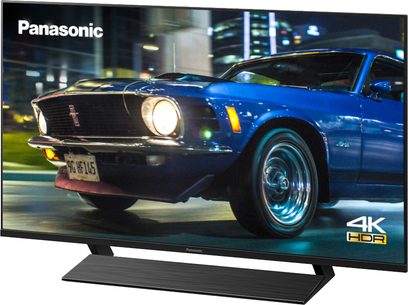Panasonic TX-50HX820E 4K HDR-fladskærms-TV, frontvisning, viser et gammelt blåt veteranbil på skærmen