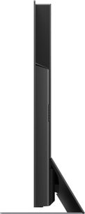 Panasonic TX-55HZ2000E fladskærms-TV, set fra siden, sort flad skærm, sølvfarvet smal ramme, sort rektangulært fod-stativ