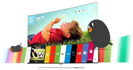 Fladskærms-tv, der viser et barn liggende i græsset med app-ikoner på skærmen i bunden
