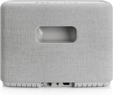 Altavoz inteligente Audio Pro A15 W gris claro visto desde atrás, con asa empotrada y conexiones en la base