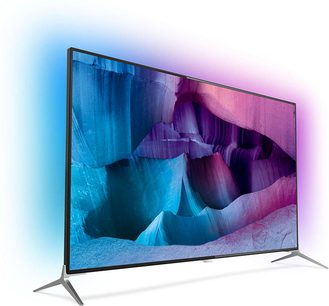 Philips 65PUS7120 fladskærms-LED-TV, sølvfarvet smal ramme, viser abstrakte former i blå og lilla farver