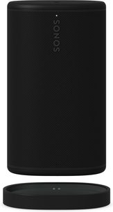 Black cylindrical portable Sonos Bluetooth speaker with front grille and separate round charging base