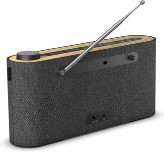 Pilka Loewe Radio Frequency stalinio radijo galinė pusė, šviesios medienos išvaizdos apdaila, išskleista teleskopinė antena