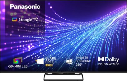 Televisor Panasonic TN-75W95C com suporte central, ecrã com faixas azuis e violetas, com os logótipos Google TV e QD-Mini LED