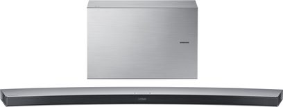 Srebrno-metaliczna soundbara Samsung HW-J8501, widok z przodu, umieszczona na szarej powierzchni