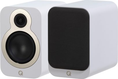 Pair of Q Acoustics 3030c bookshelf speakers, matte white rectangular cabinet with rounded corners, champagne metal trim surrounding the tweeter and black woofer on the first speaker, second speaker fitted with a black fabric front grille, three-quarter front view