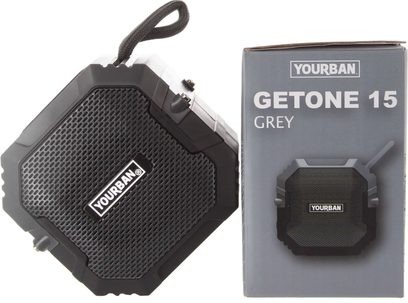 Yourban Getone 15 gri, kare Bluetooth hoparlör, siyah ızgara, merkezde logo, sol üst köşede kordonlu, sağda kutu