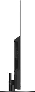 Téléviseur Panasonic TX-65MZ1500E, vue de profil, écran plat, cadre et pied noirs, ports HDMI et USB sur le côté
