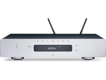 Primare I15 Prisma MK2 silver stereo hi-fi amplifier, front view, rectangular silver metal chassis, central digital display, two rotary knobs